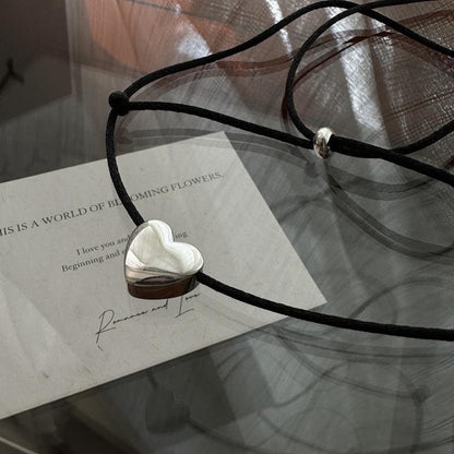 Silver Heart Necklace With Silk Strand