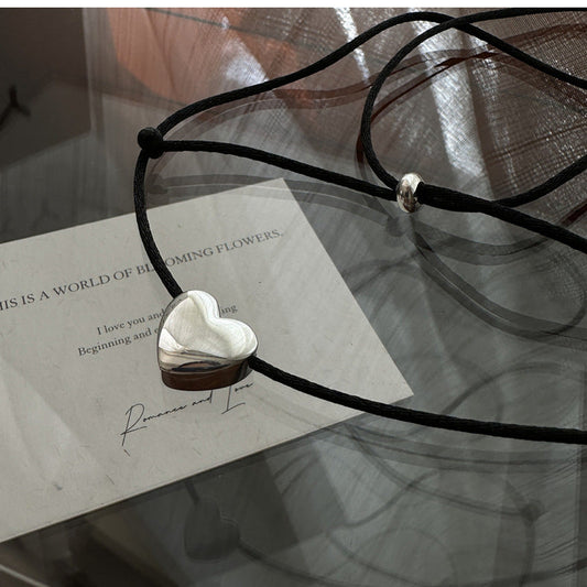 Silver Heart Necklace With Silk Strand